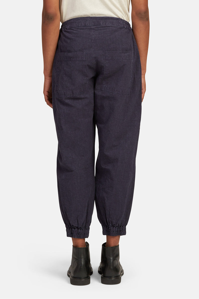 Trousers with checkerboard pattern