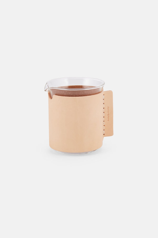 Beaker with leather lining